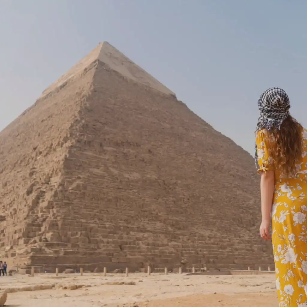 Top 5 Reasons to Visit Egypt in 2025 6 Woman look the to pyramids